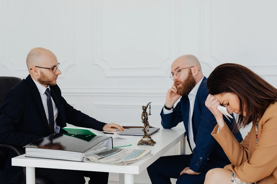 The Integra Change Management team posing in a modern office environment.